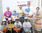 Eine Gruppe von 9 Menschen, die sich für Organspende engagieren